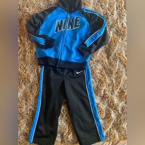 Like new Nike blue and black boys tracksuit in size 24 months